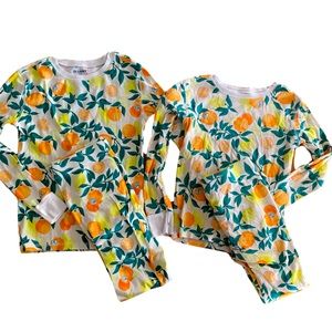 Children’s matching pjs set sun kissed orange. Unisex sizes 10 & 8